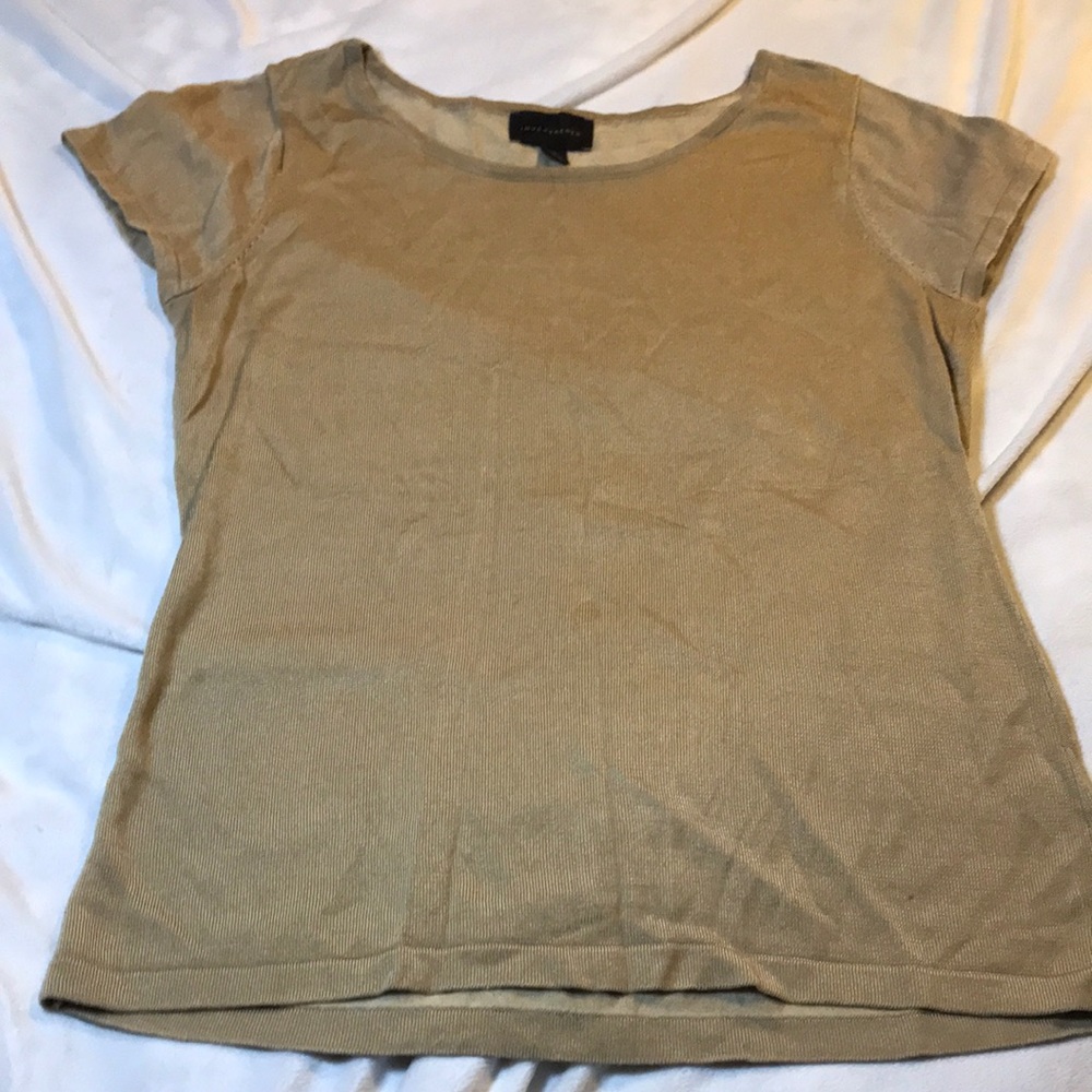 Shimmery top gold like in color